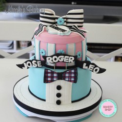Cake with mustaches, tie and bow